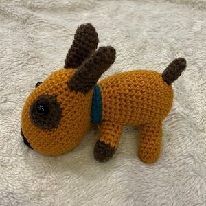 Homemade crochet puppy dog circle around eye
